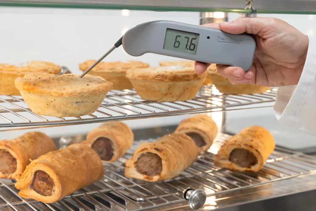 235-407-Thermapen-ONE-Instant-Read-Thermometer-In-Use.webp