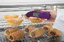 235-507-Thermapen-ONE-Instant-Read-Thermometer-2-In-Use.webp